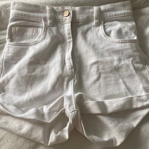 White Wilfred jean shorts from aritzia button is rose gold